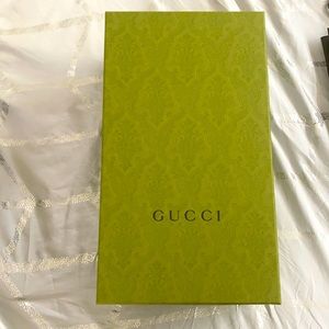 Several Gucci shoeboxes